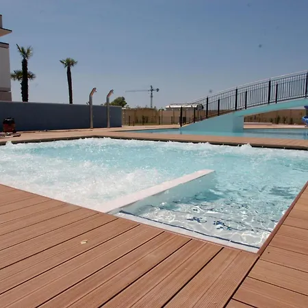 Elegant Pool-front Flat With Fenced Garden