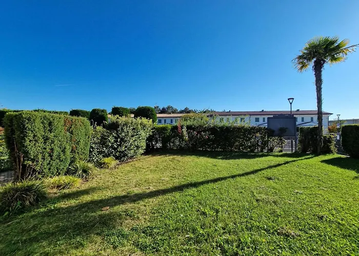 Elegant Pool-front Flat With Fenced Garden