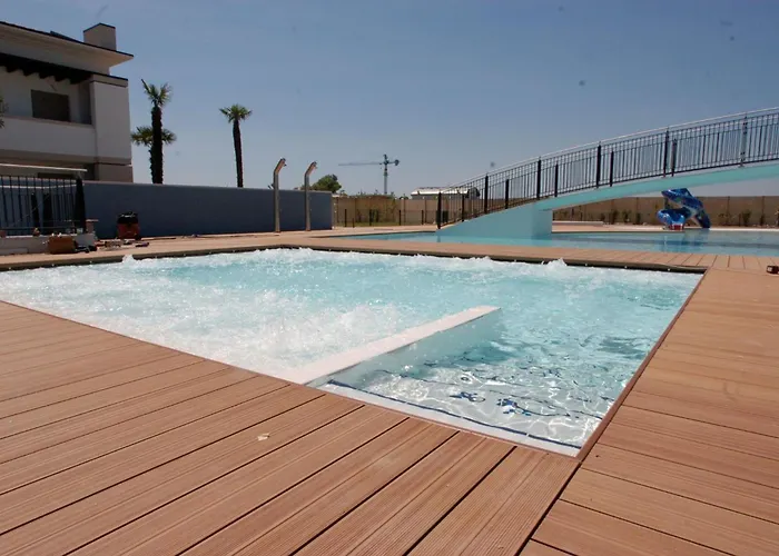Elegant Pool-front Flat With Fenced Garden